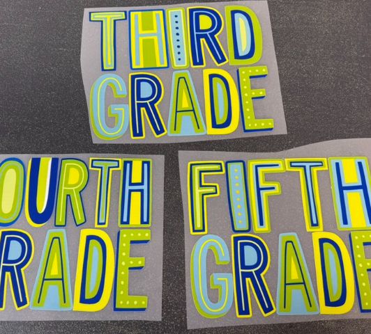 Blues and Greens grade school shirts