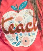 Teach with floral apple