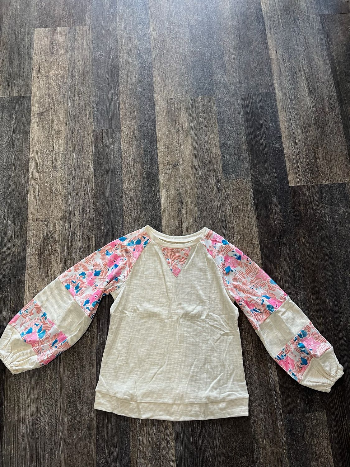 Textured long sleeve floral top