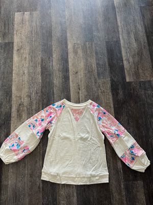 Textured long sleeve floral top