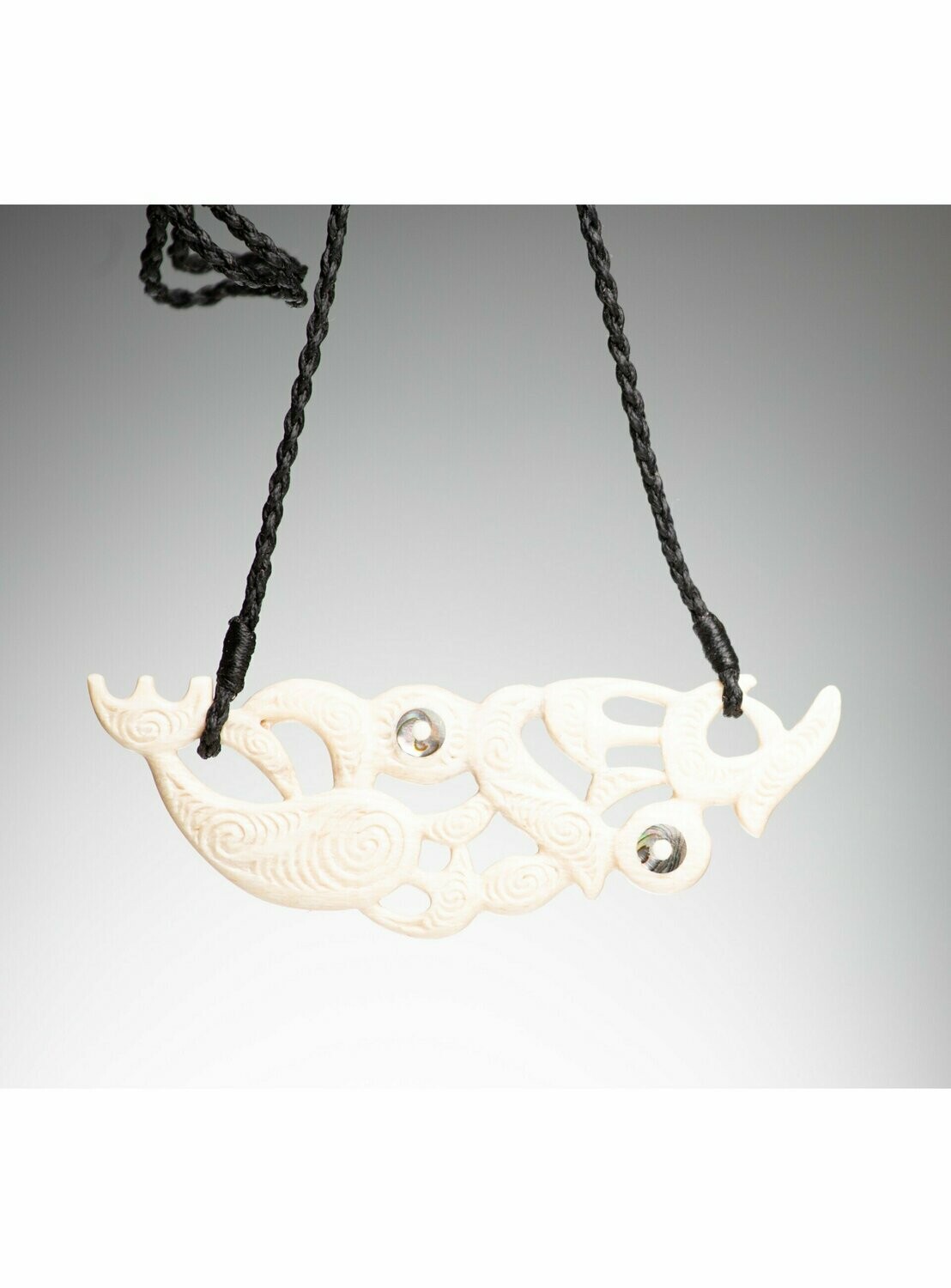 Whale Bone Carving Stylised Manaia with Kowhaiwhai