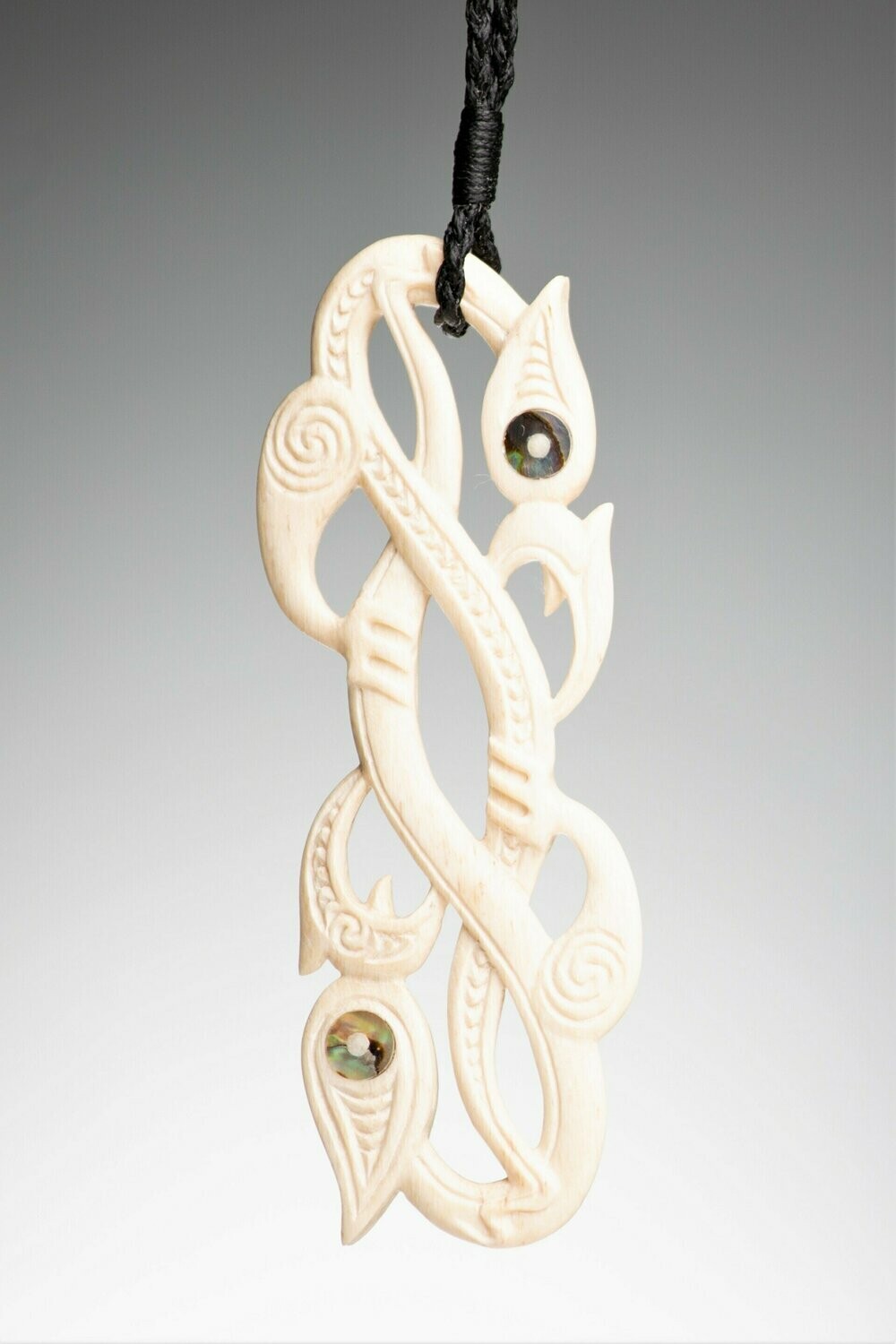 Whale Bone Carving Stylised Double Manaia with Kowhaiwhai
