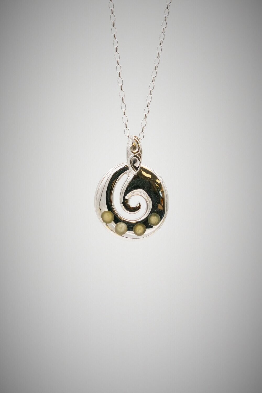 Moko Pounamu Contemporary Koru Greenstone and Sterling Silver Pendant - SALE Moko Pounamu Contemporary Koru Greenstone and Sterling Silver Pendant - SALE
