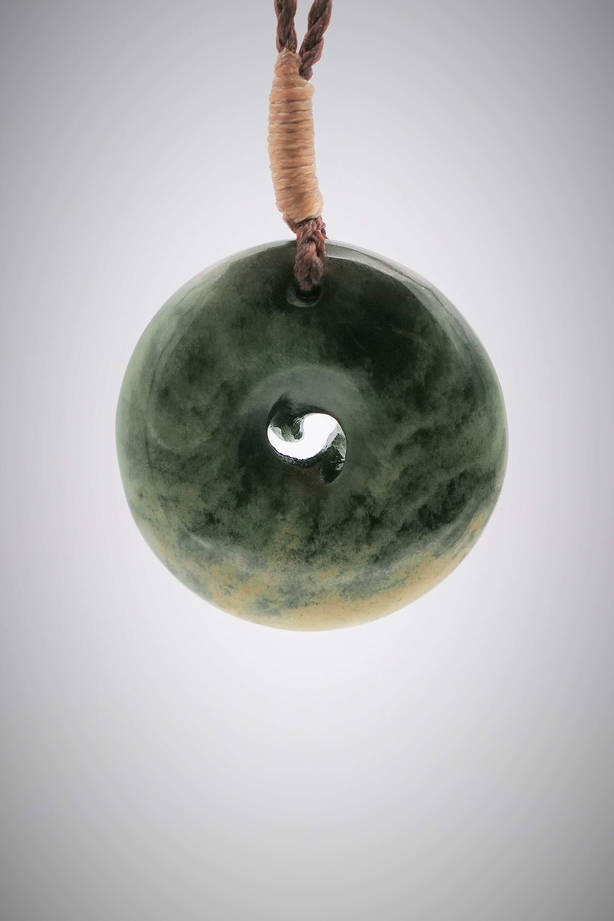 Moko Pounamu Contemporary Koru NZ Genuine Kawakawa Flower Greenstone - Wharetana