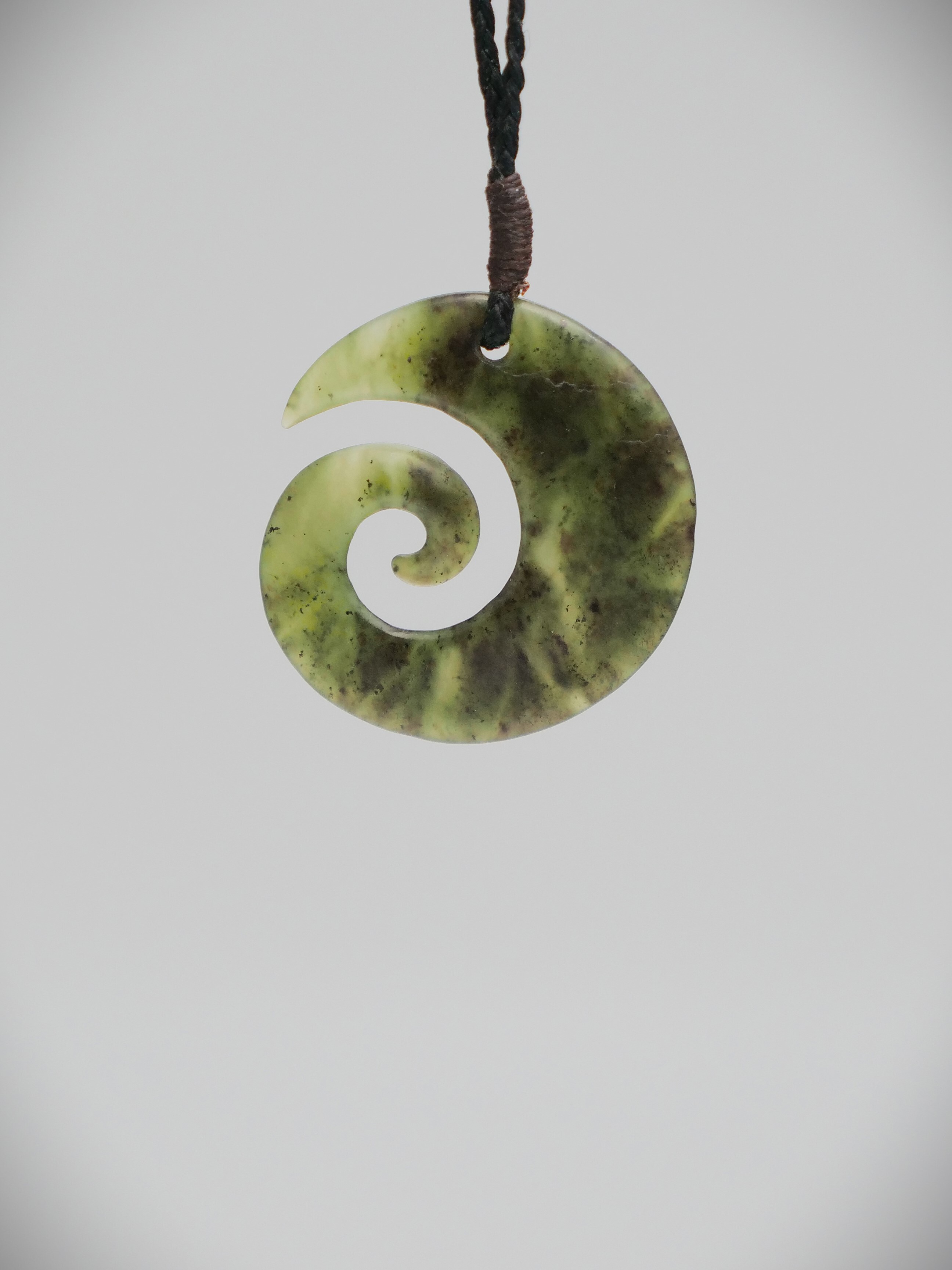 Moko Pounamu Contemporary Koru NZ Genuine Totoweka Greenstone - Te Kopuru
