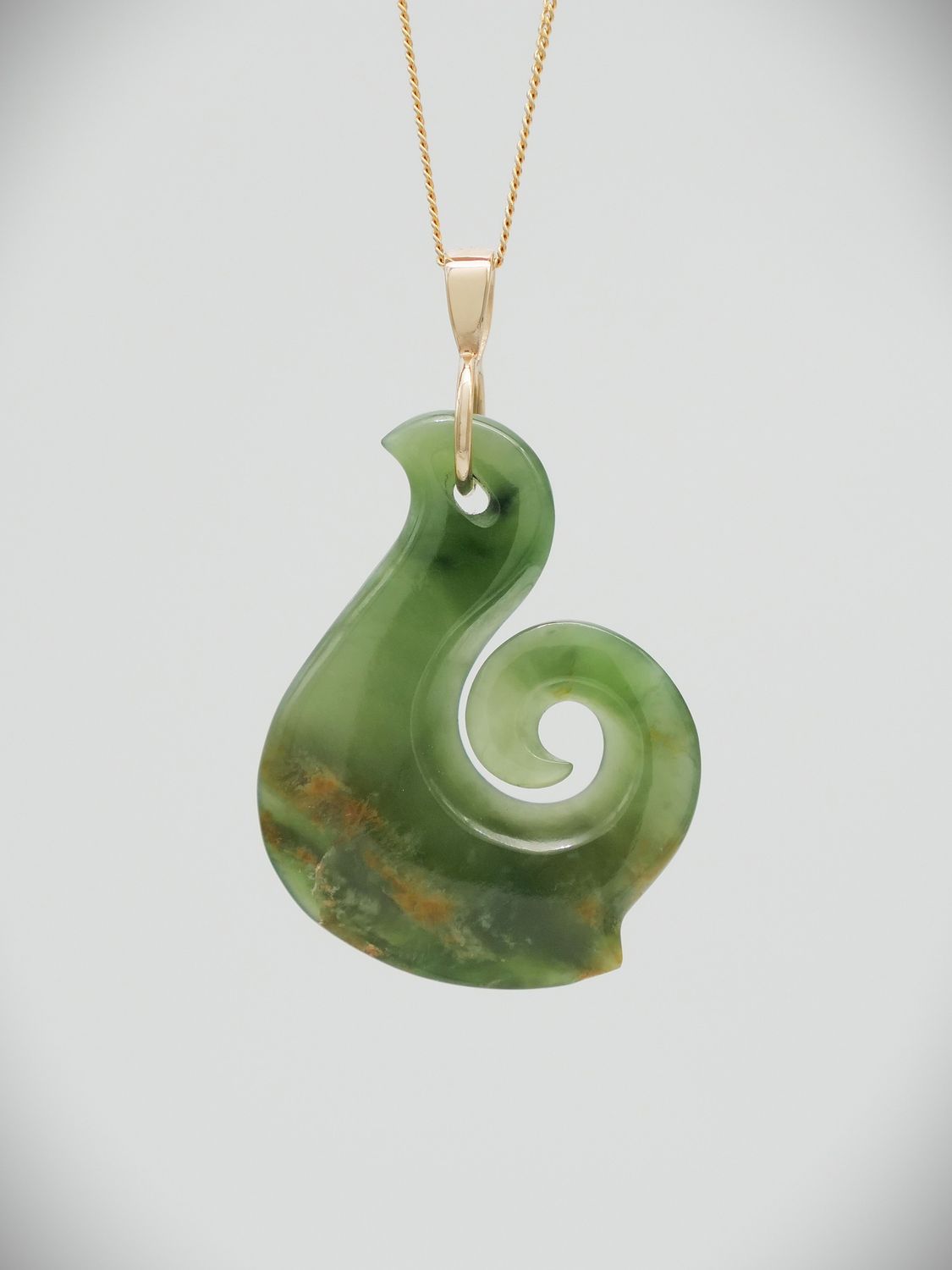 Moko Pounamu Hei Matau (Hook) NZ Genuine Marsden Flower Greenstone and 9ct Gold Pendant - Te Kakano