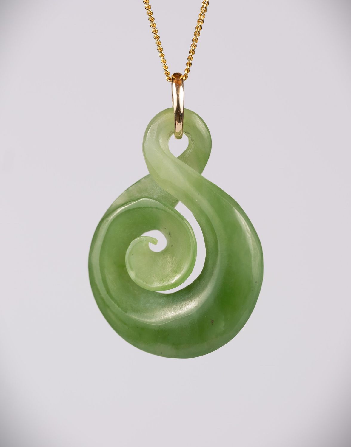 Moko Pounamu Single Pikorua (Twist) with Koru NZ Genuine Kahurangi Greenstone & 9ct Gold Pendant - Whatatorere