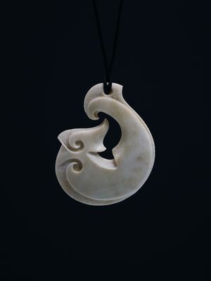 Moko Pounamu, Hei Matau (Hook) Whale Bone Carving - Wanaka