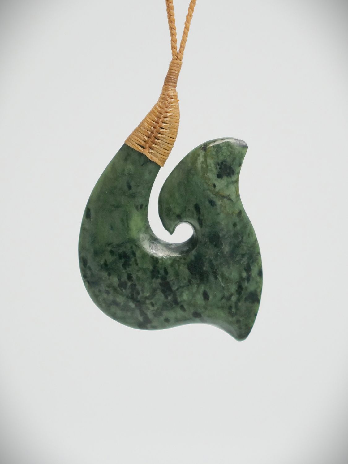 Moko Pounamu Hei Matau (Hook) NZ Genuine Kokopu Greenstone - Paraite