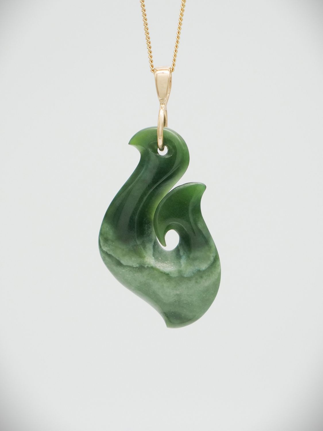 Moko Pounamu Hei Matau (Hook) NZ Genuine Kawakawa Flower Greenstone and 9ct Gold Pendant - Taramoa