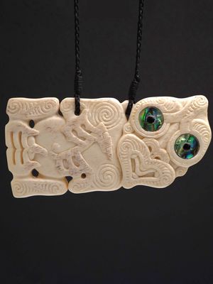 Moko Pounamu Hei Tiki Genuine Whale Bone Carving - Kuriwao
