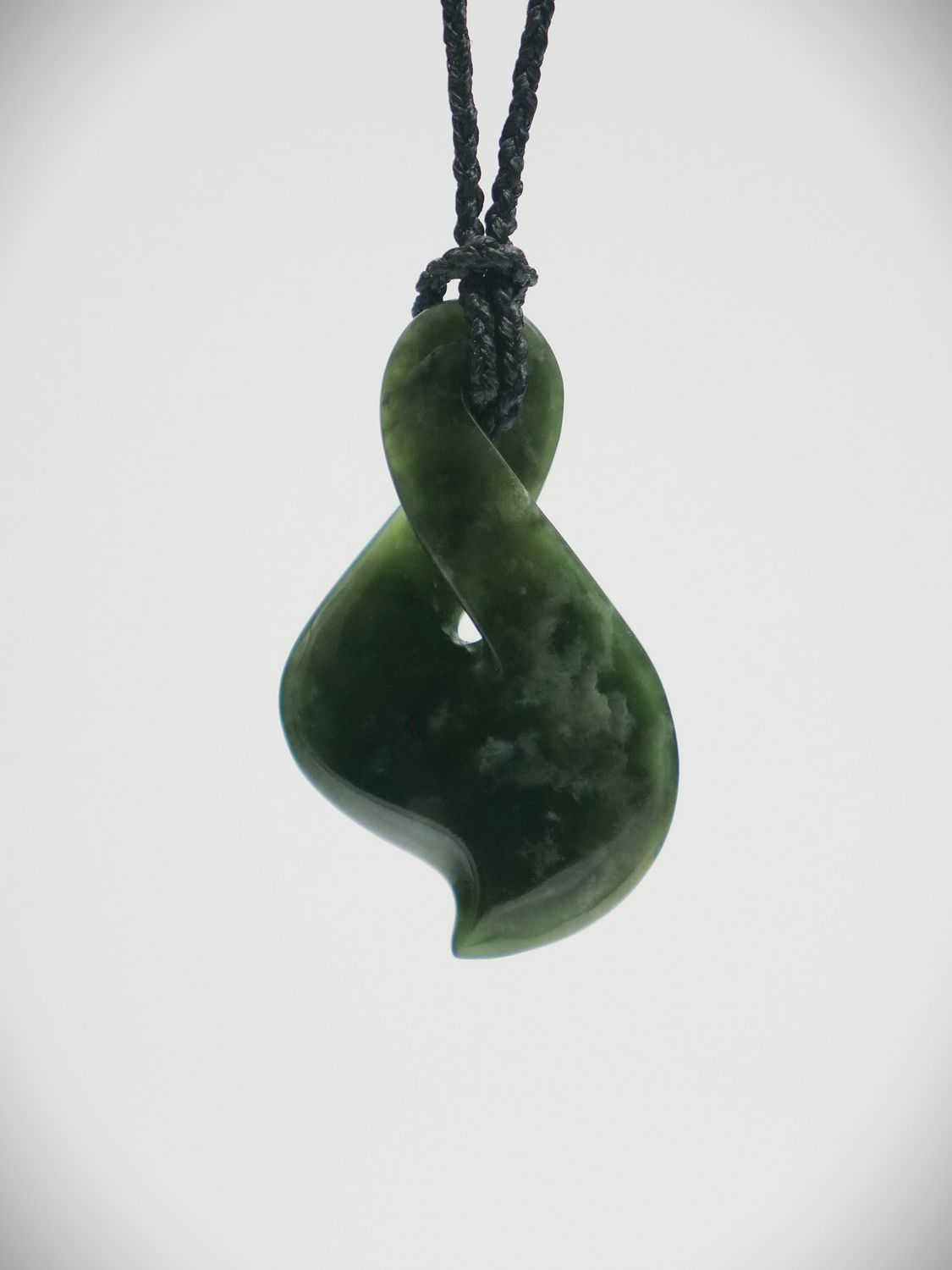 Moko Pounamu Single Pikorua (Twist) NZ Genuine Kawakawa Flower Greenstone - Waikirikiri