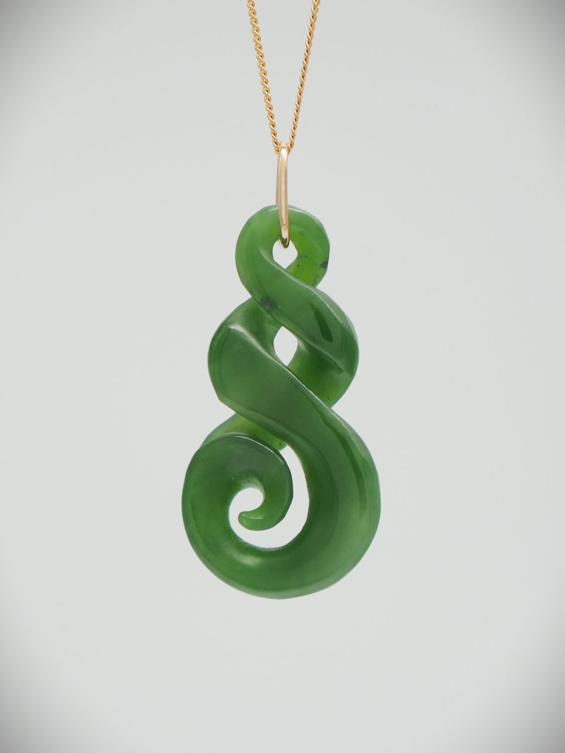 Moko Pounamu Double Pikorua (Twist) with Koru NZ Genuine Kahurangi Greenstone & 9ct Gold Pendant - Herekopare