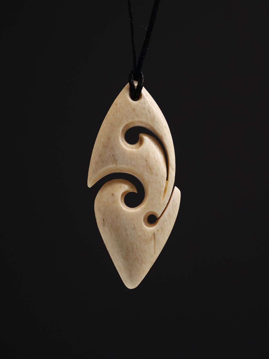 Moko Pounamu,  Koru Whale Bone Carving - Akatore