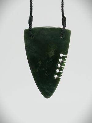 Moko Pounamu Notched Rei Niho (Tooth) NZ Genuine Kawakawa Greenstone - Awahou Moko Pounamu Notched Rei Niho (Tooth) NZ Genuine Kawakawa Greenstone - Awahou