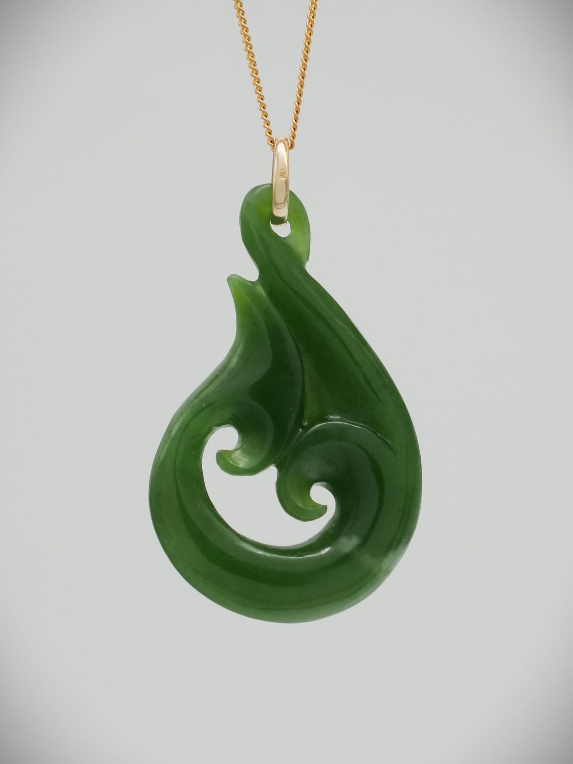 Moko Pounamu Hei Matau (Hook) NZ Genuine Kahotea Greenstone and 9ct Gold Pendant - Hauroko