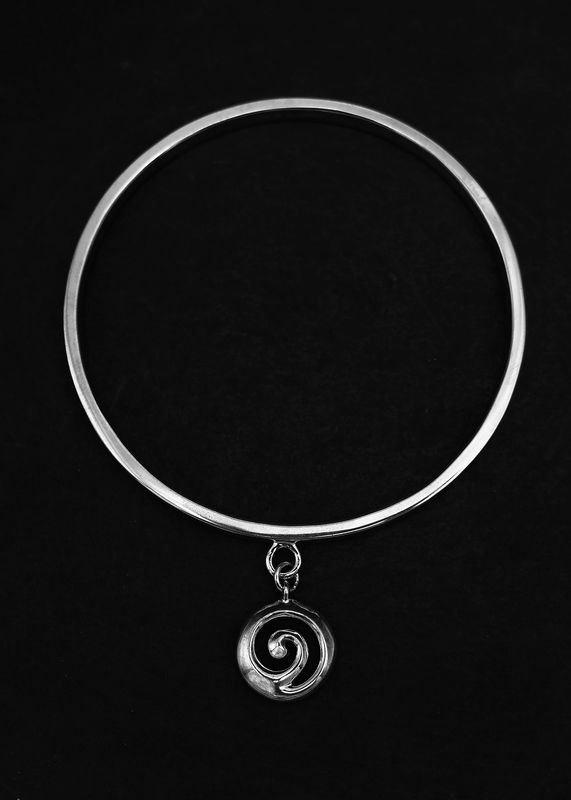 Moko Pounamu Sterling Silver Bangle with Koru Charm Moko Pounamu Sterling Silver Bangle with Koru Charm