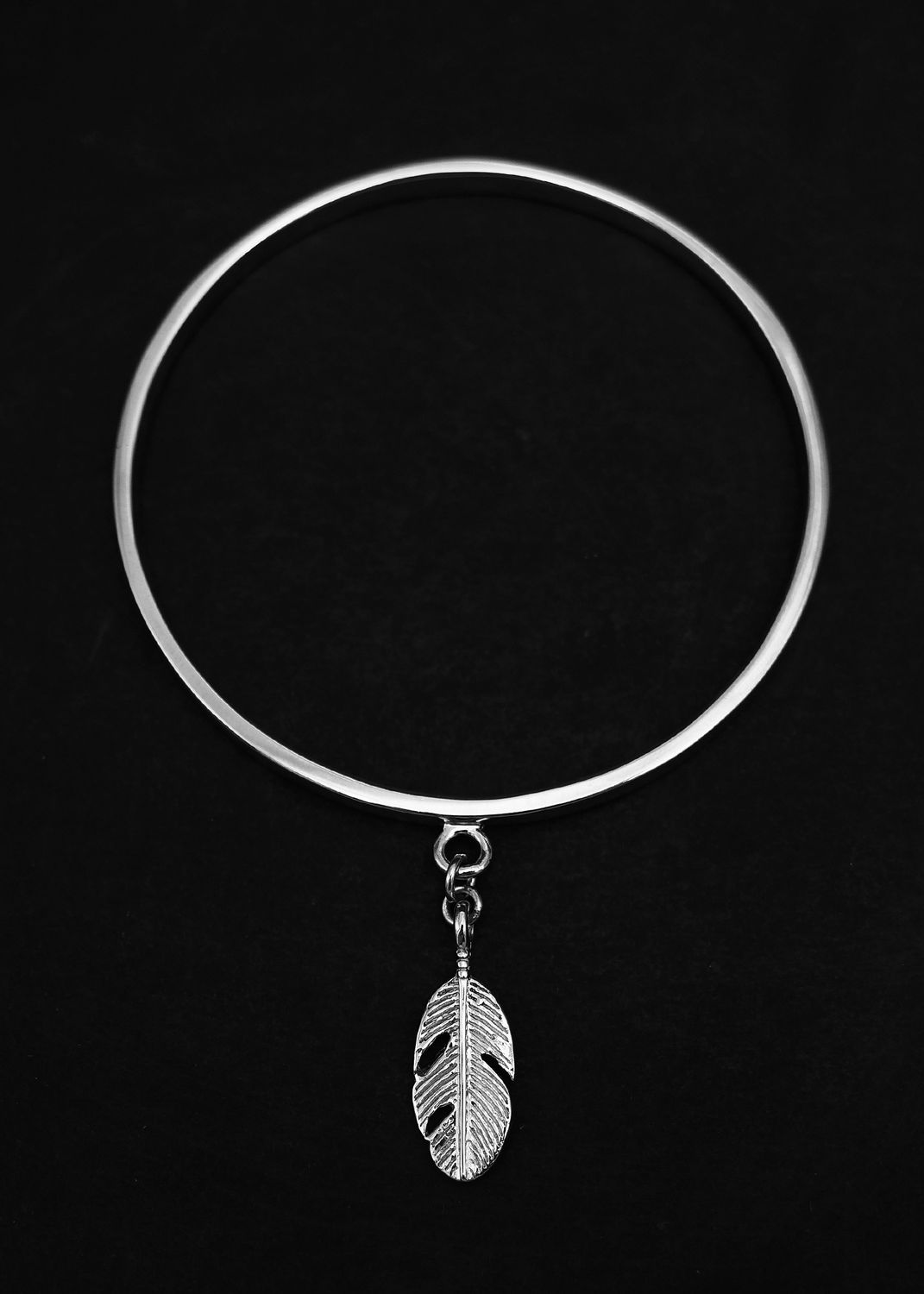 Moko Pounamu Sterling Silver Bangle with Feather Charm