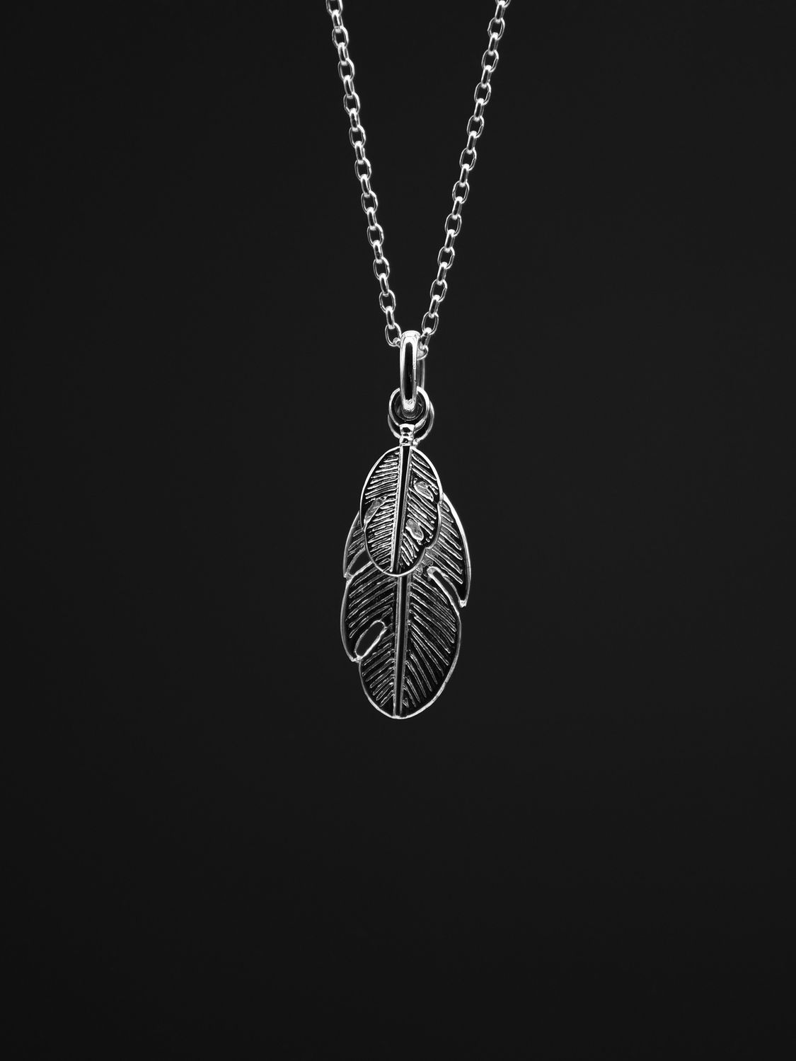 Moko Pounamu Sterling Silver Necklace with Double Feather Charm