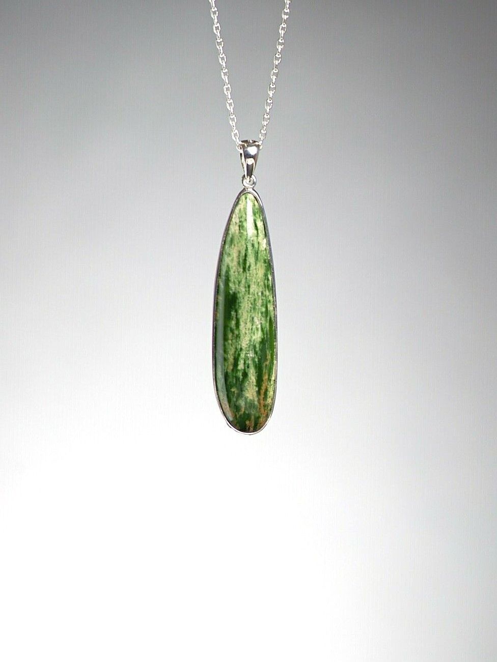 Moko Pounamu Kahurangi Flower Greenstone and Sterling Silver Pendant 00895