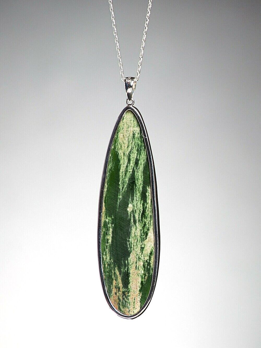 Moko Pounamu Kahurangi Flower Greenstone and Sterling Silver Pendant 00910