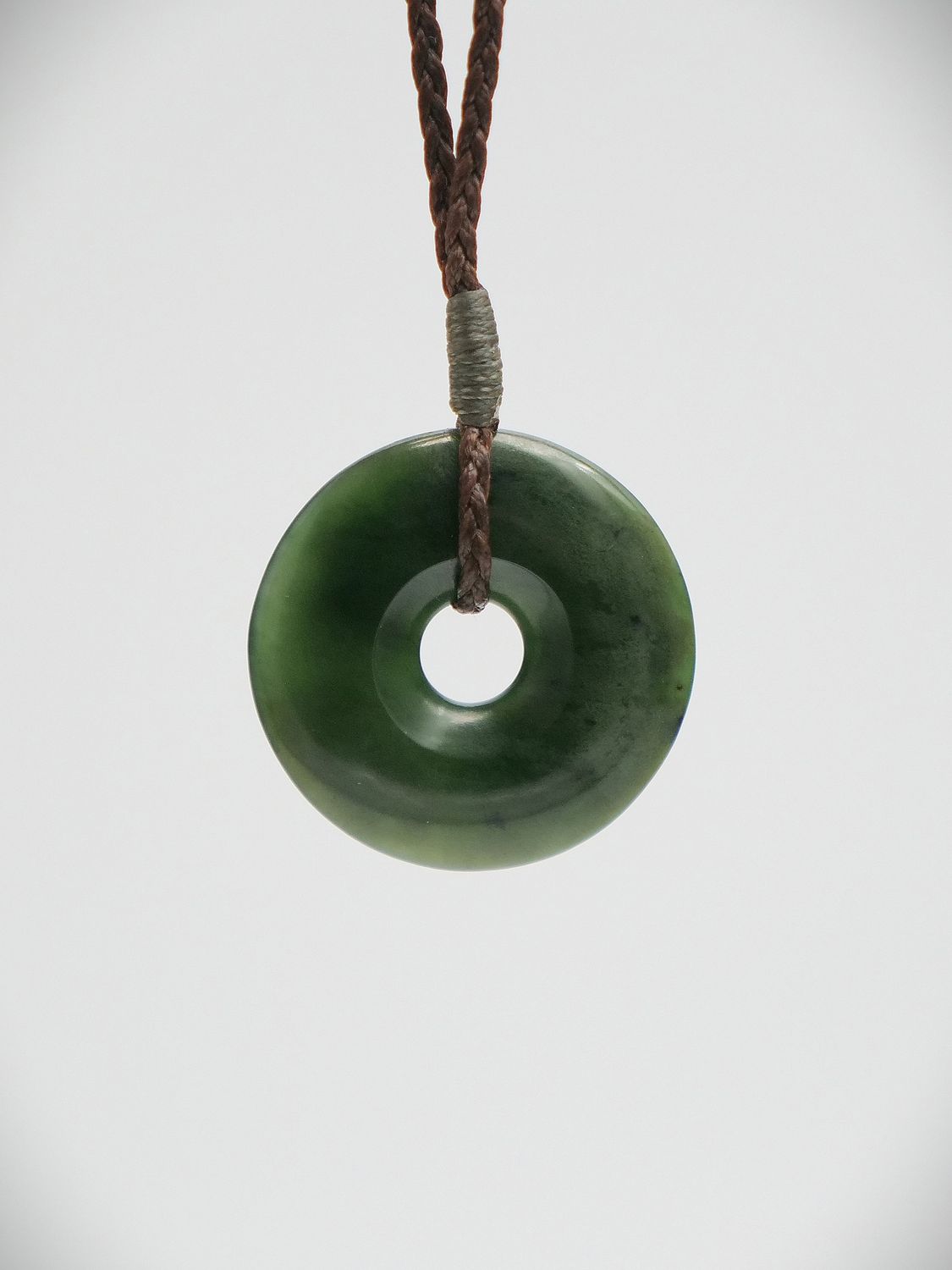 Moko Pounamu Porohita (Disc) NZ Genuine Kawakawa Flower Greenstone - Kaiteriteri