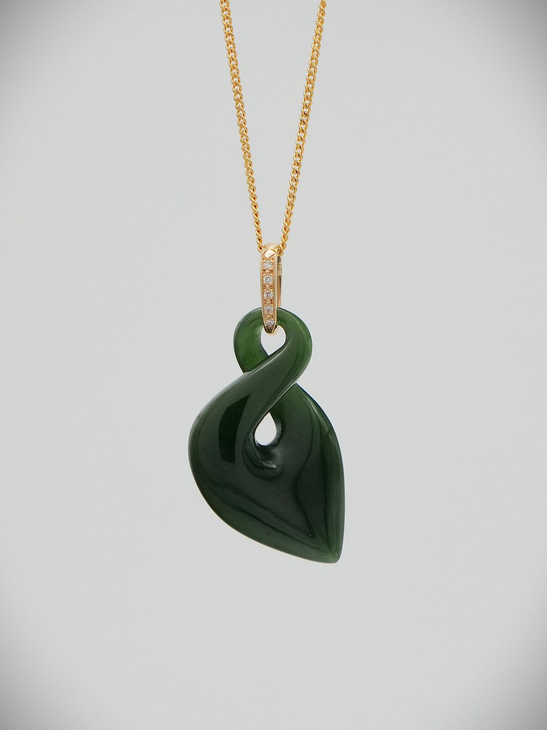 Moko Pounamu Single Pikorua (Twist) NZ Genuine Kawakawa Greenstone & 9ct Gold Diamond Pendant - Wairaurahiri