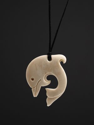 Moko Pounamu Dolphin Bone Carving - Te Kaika Moko Pounamu Dolphin Bone Carving - Te Kaika