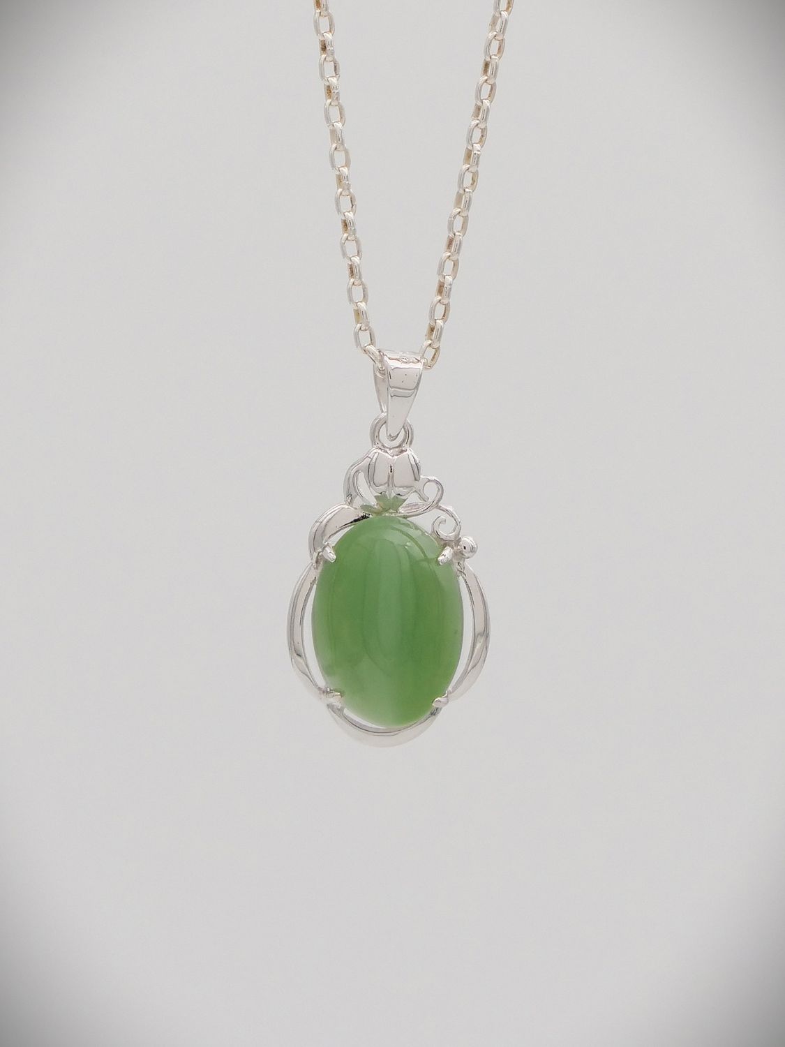 Moko Pounamu NZ Genuine Inanga Greenstone and Sterling Silver Cats Eye Pendant - Aria
