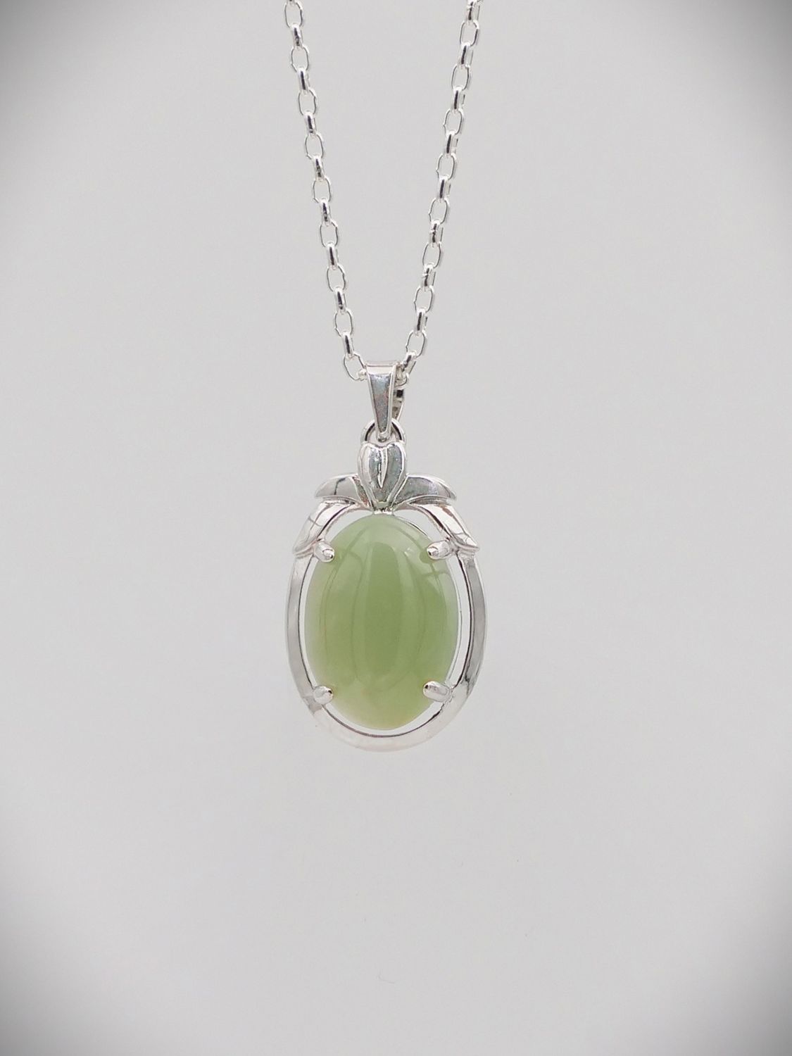 Moko Pounamu NZ Genuine Inanga Greenstone and Sterling Silver Cats Eye Pendant - Orongo