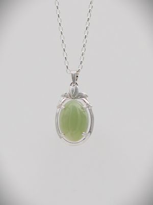 Moko Pounamu NZ Genuine Inanga Greenstone and Sterling Silver Cats Eye Pendant - Orongo