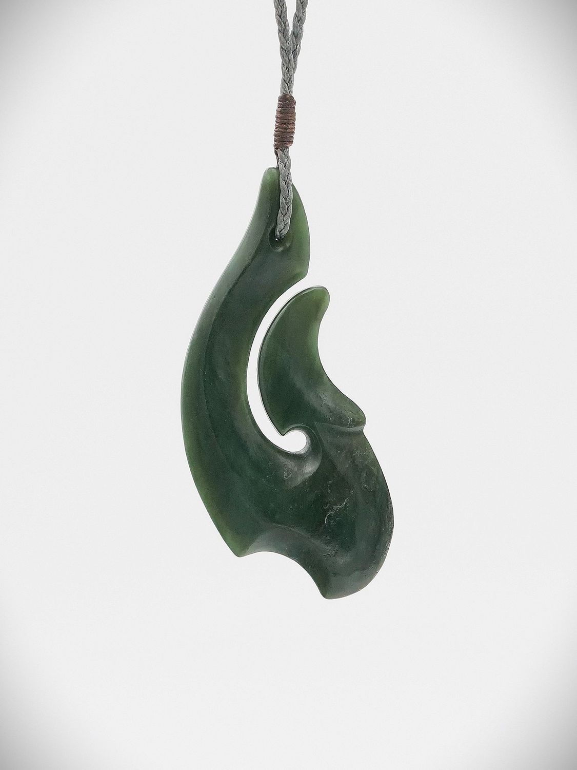 Moko Pounamu Hei Matau (Hook) NZ Genuine Kawakawa Greenstone - Takamatua