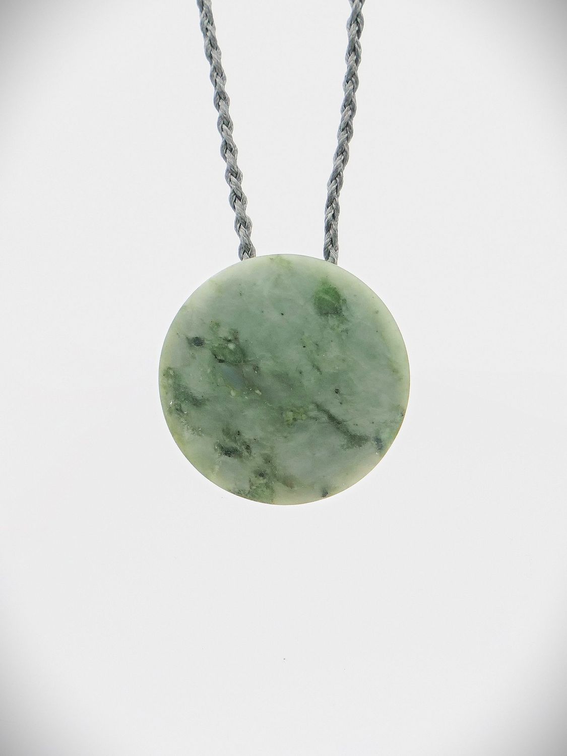 Moko Pounamu Porohita (Disc) NZ Genuine Nelson Te Tau Ihu Kokopu Greenstone - Tuki Tuki