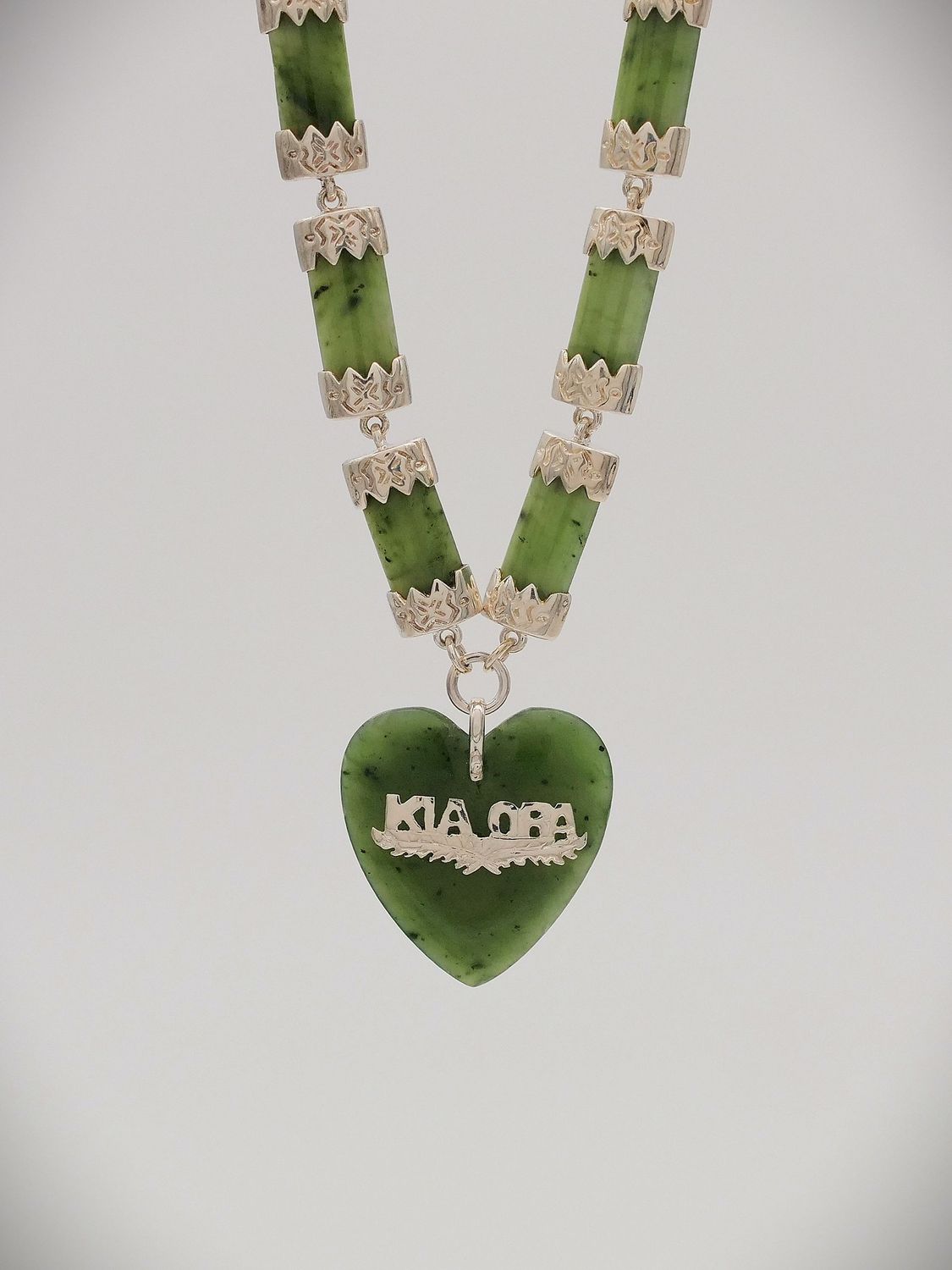 Moko Pounamu Kia Ora Heart NZ Genuine Kawakawa Greenstone Sterling Silver Necklace - Manawa