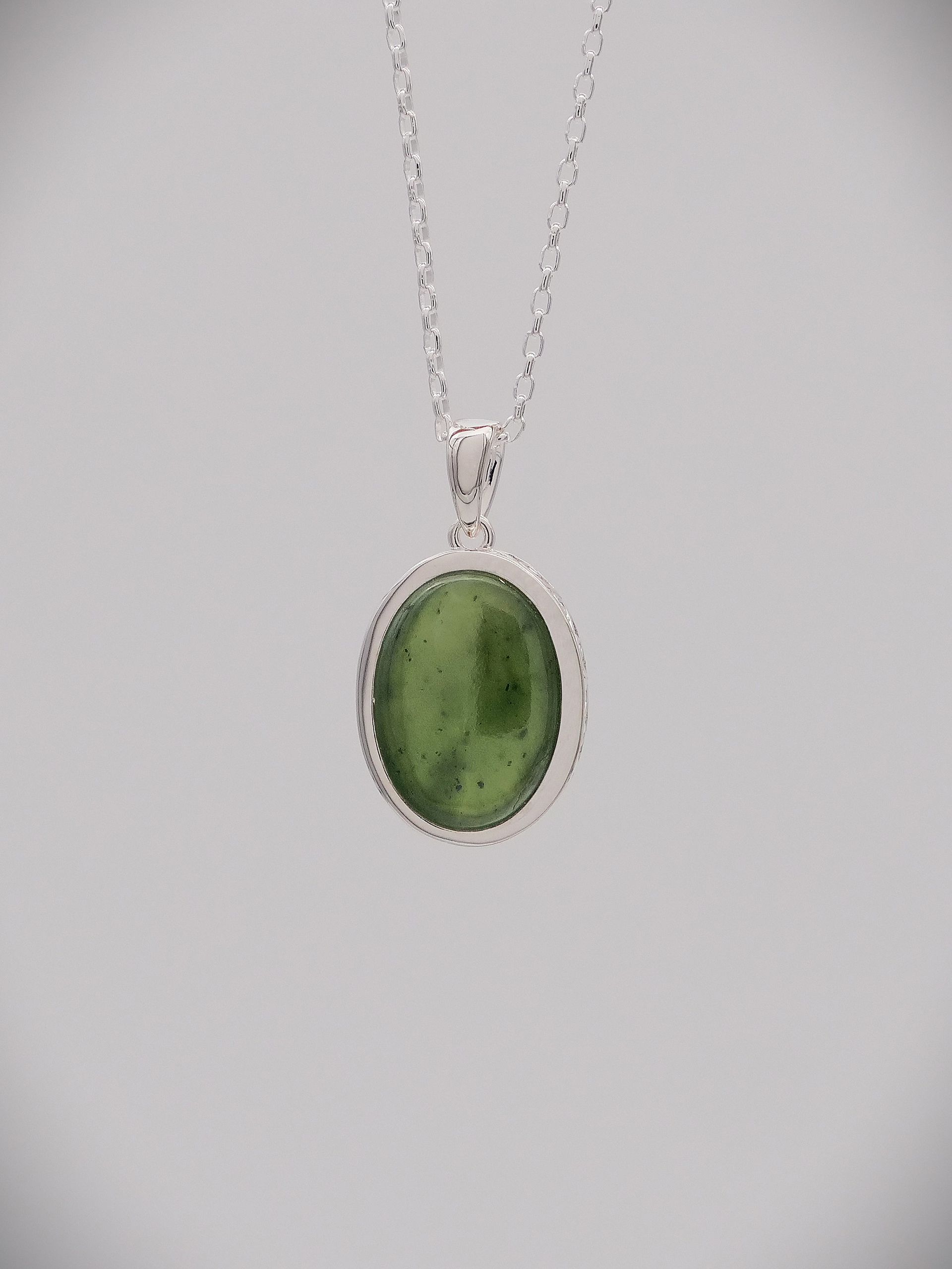 Moko Pounamu Greenstone and Sterling Silver Double Koru Filigree Oval Pendant - KO1​