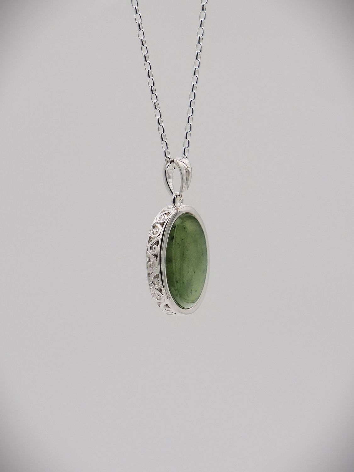 Moko Pounamu Greenstone and Sterling Silver Double Koru Filigree Oval Pendant - KO1​
