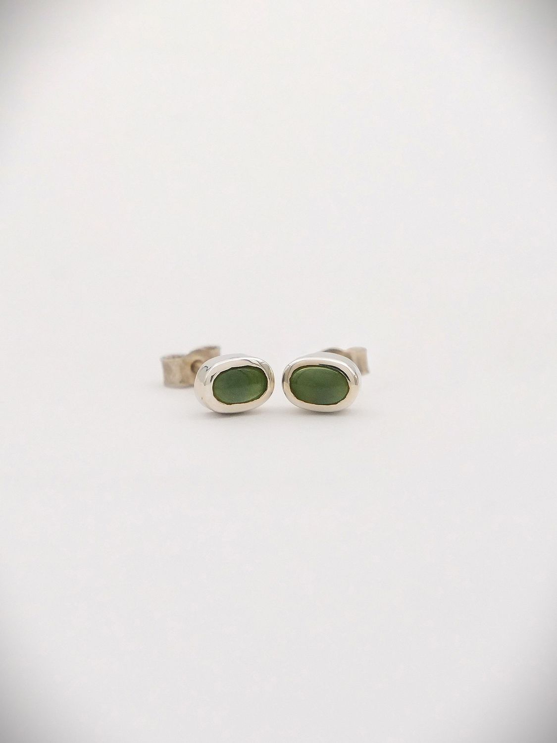 Moko Pounamu NZ Genuine Kahurangi Greenstone & Sterling Silver 7mm Oval Stud Earrings - Parinui