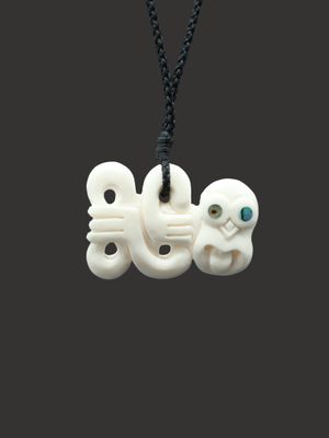 Moko Pounamu Hei Tiki Bone Carving - Ouruwera