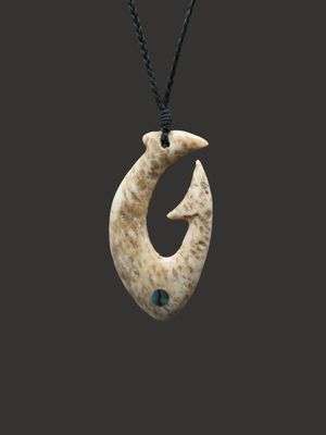 Moko Pounamu Hei Matau (Hook) Whale Bone Carving - Totaranui Moko Pounamu Hei Matau (Hook) Whale Bone Carving - Totaranui