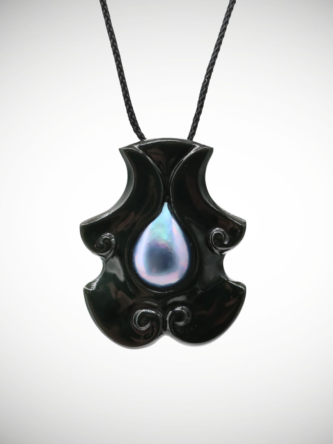 Moko Pounamu Australian Black Jade & Paua Pearl Pendant - Kaiparoro
