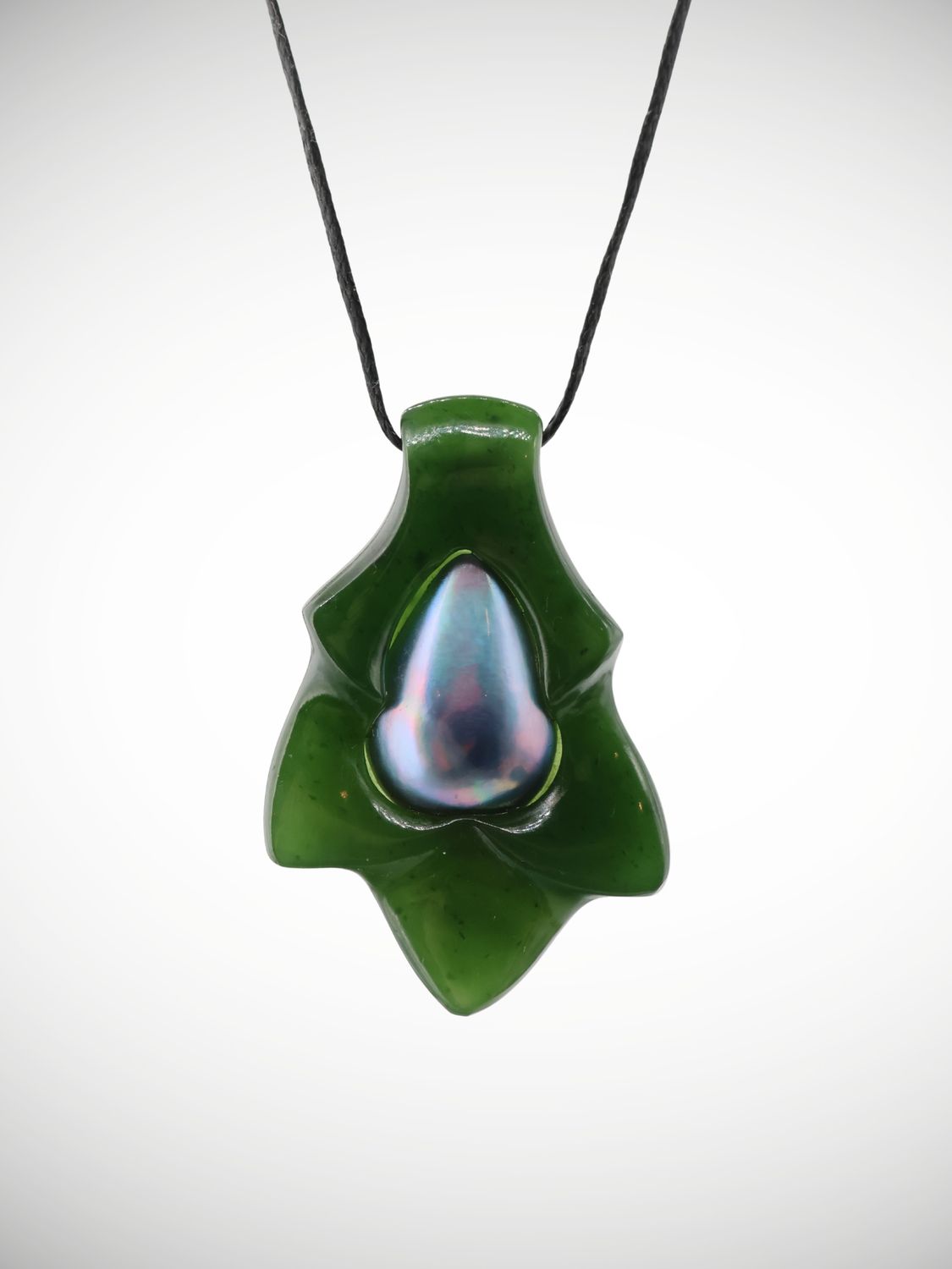 Moko Pounamu Genuine NZ Kahurangi & Blue Paua Pearl Pendant - Kaipuke