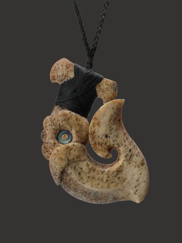 Genuine whalebone carving hei matau pendant