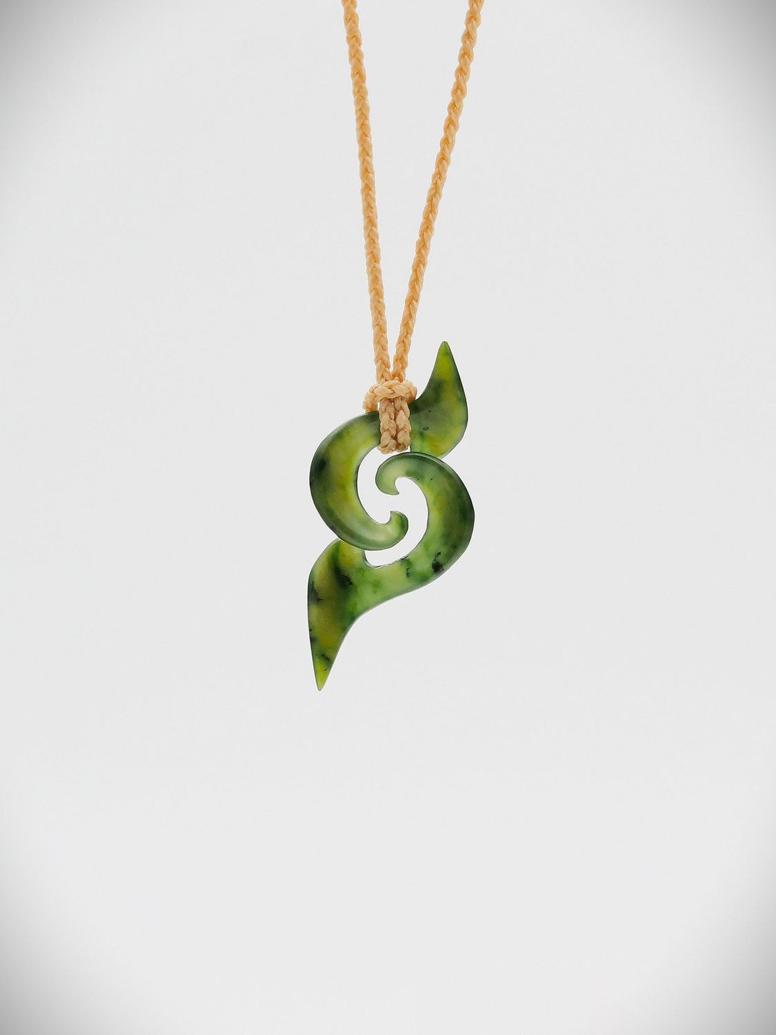 Moko Pounamu Double Koru NZ Genuine Kawakawa Greenstone - Taratahi