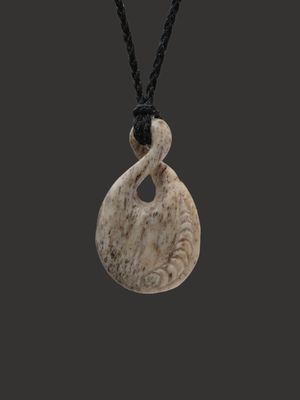 Moko Pounamu Pikorua (Twist) Genuine Whale Bone Carving - Kaharoa Moko Pounamu Pikorua (Twist) Genuine Whale Bone Carving - Kaharoa