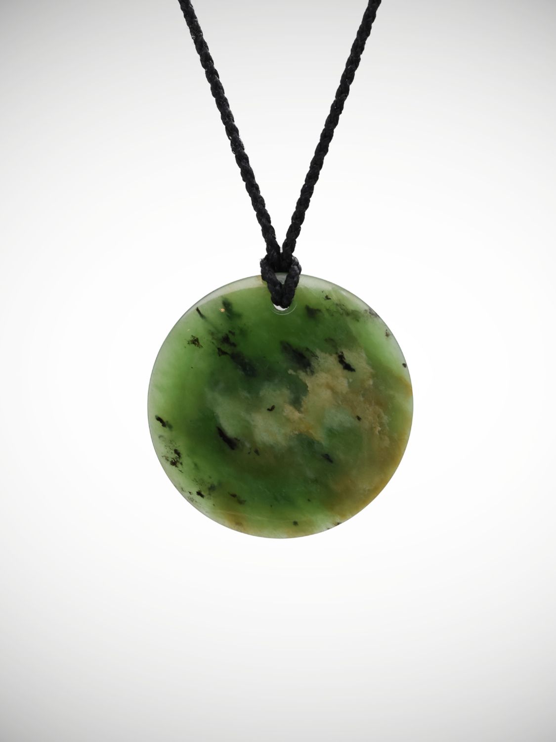 Moko Pounamu Porohita Disc Genuine NZ Kahurangi Flower Greenstone - Auroa