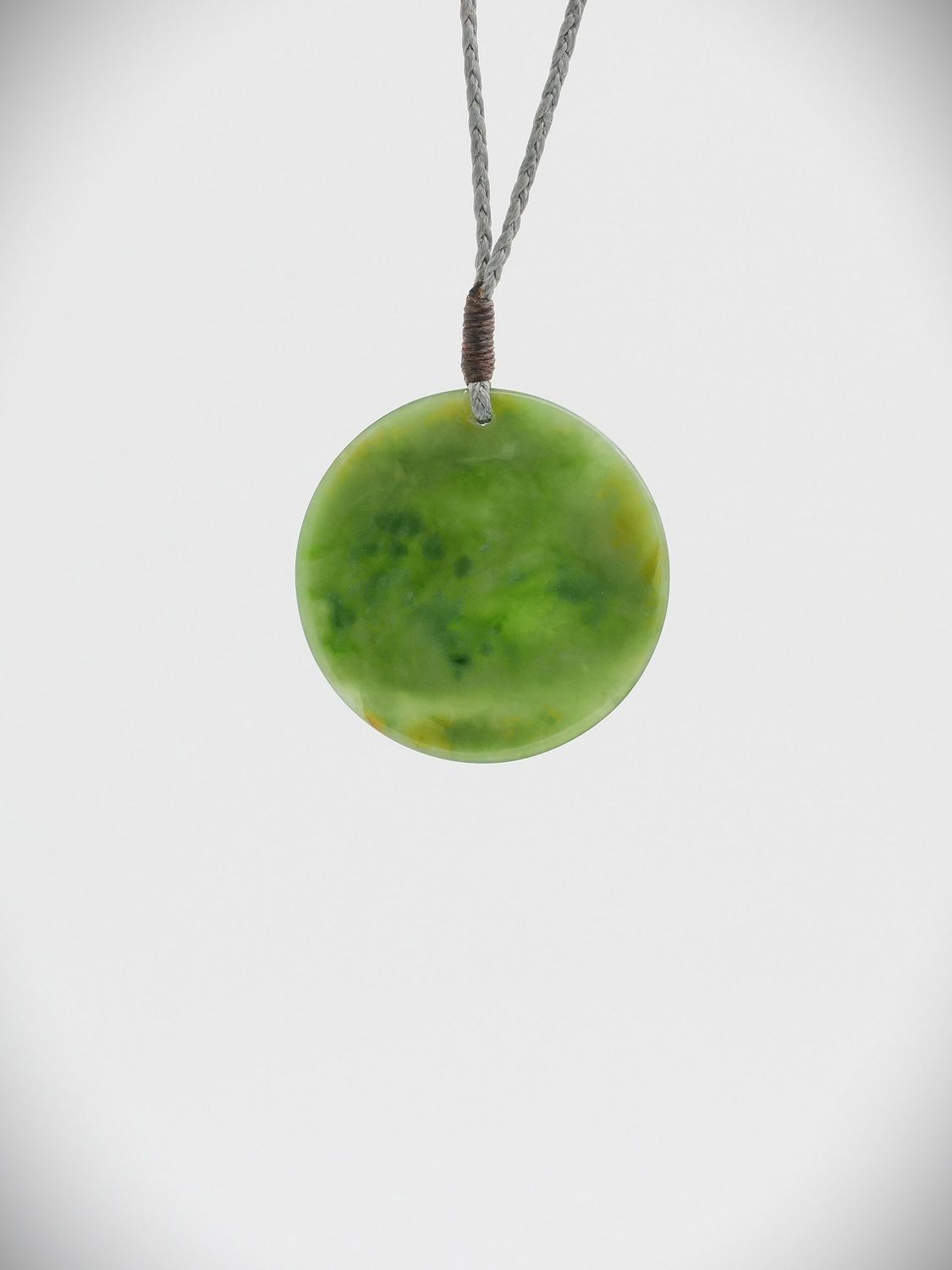 Moko Pounamu Porohita (Disc) NZ Genuine Kahurangi Greenstone - Tangarakau
