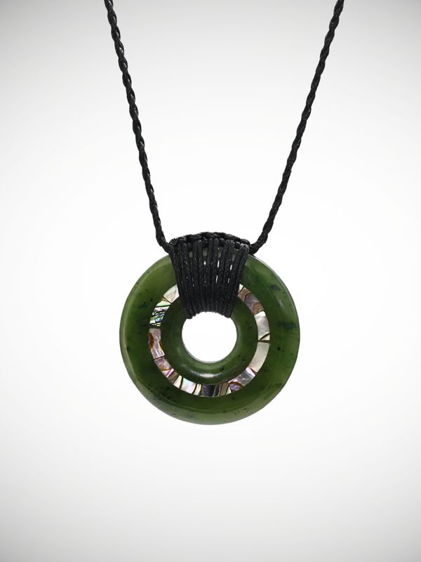 Moko Pounamu Porohita (Disc) Genuine NZ Kawakawa Greenstone - Auripo Moko Pounamu Porohita (Disc) Genuine NZ Kawakawa Greenstone - Auripo