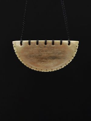 Moko Pounamu,  Kouma Breastplate Whale Bone Carving - Puaha