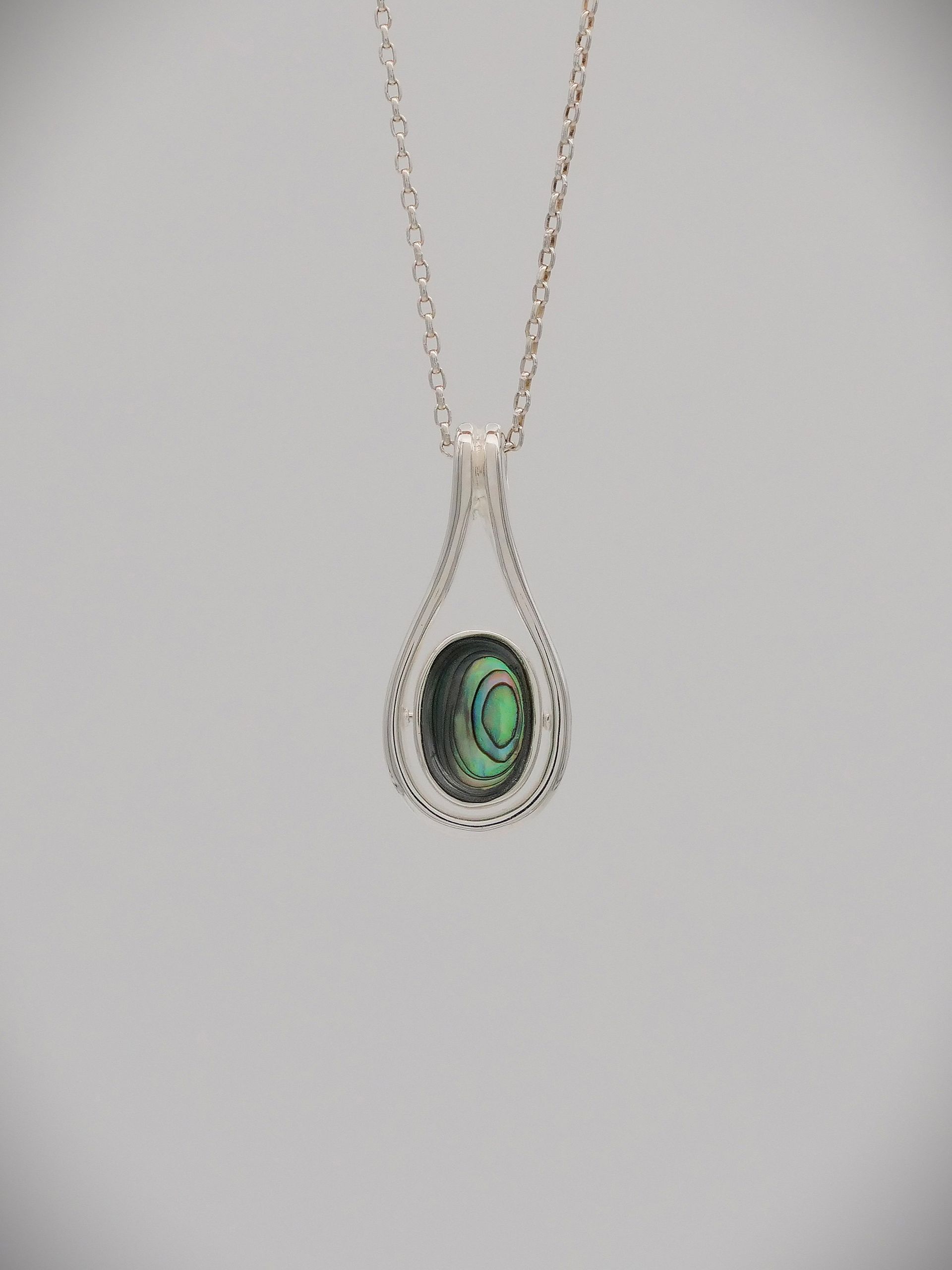 Moko Pounamu Greenstone, Paua and Silver Oval spinning Pendant - 91JP