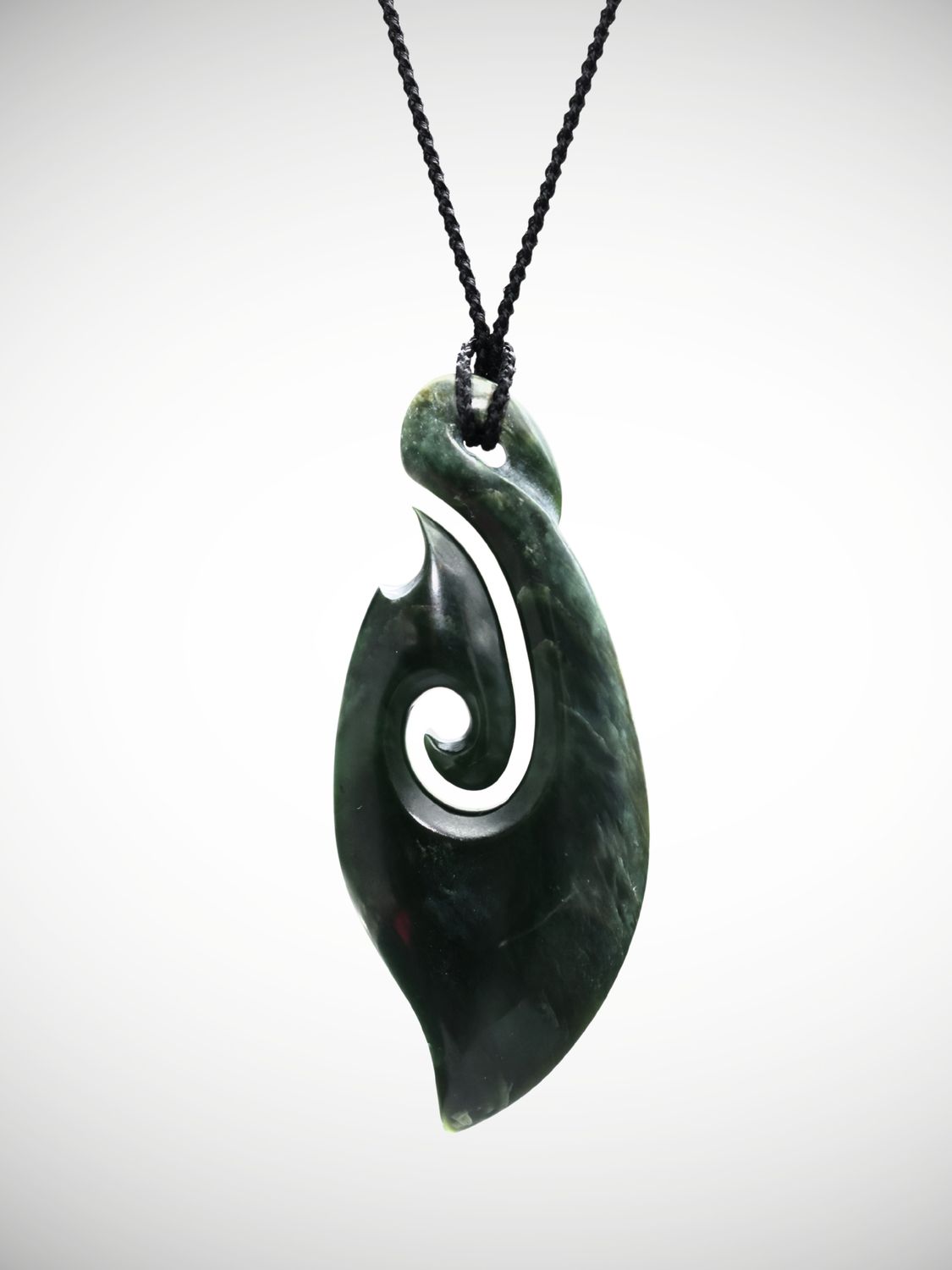 Moko Pounamu Hei Matau Genuine NZ Kawakawa Greenstone - Motutaiko Moko Pounamu Hei Matau Genuine NZ Kawakawa Greenstone - Motutaiko